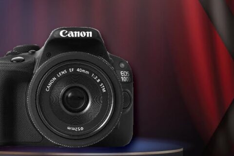 Black color Canon camera with red & black background