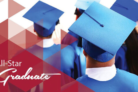 Graduates with blue hat facing their back