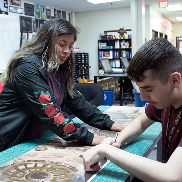 graphic design students in class