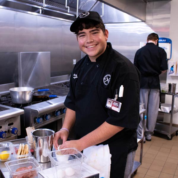 Culinary students in the kitchen learning