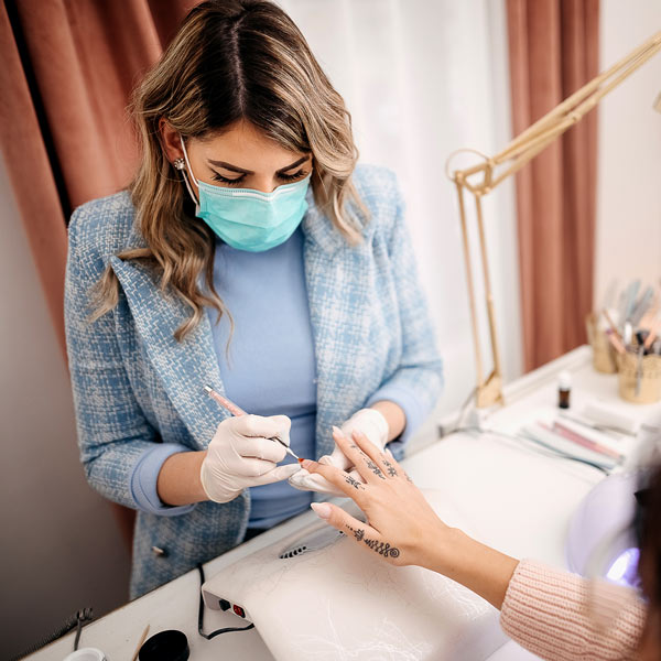 nail technician working