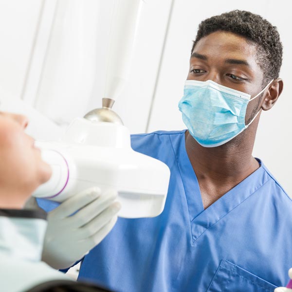 dental student with patient