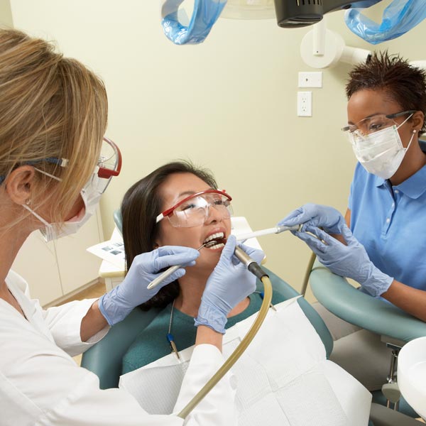dental professionals with patient