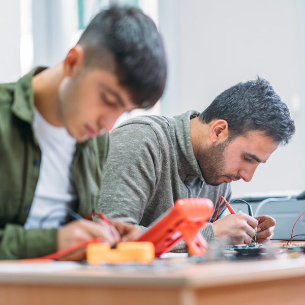 students working on electronics