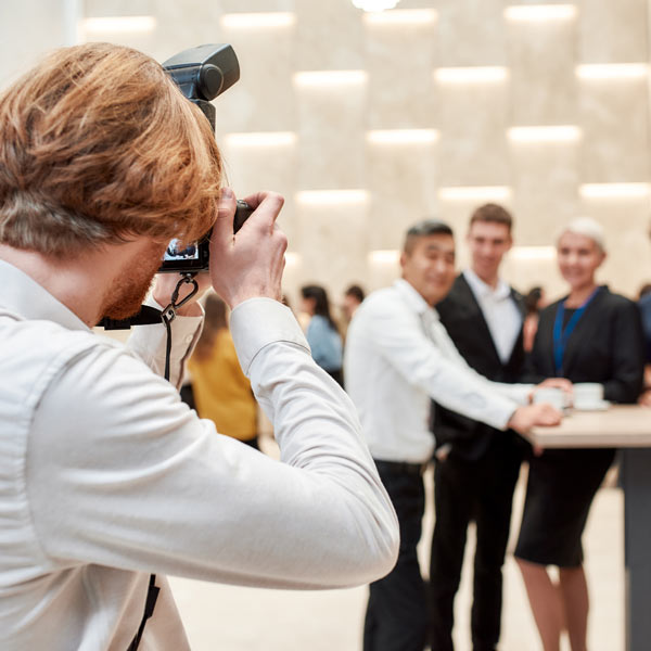person taking pictures of people