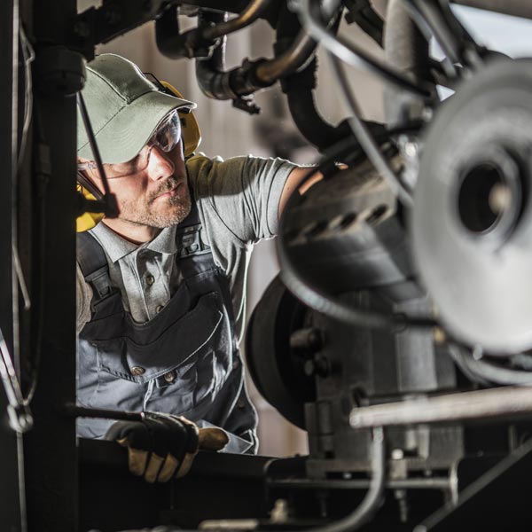 diesel mechanic working on car