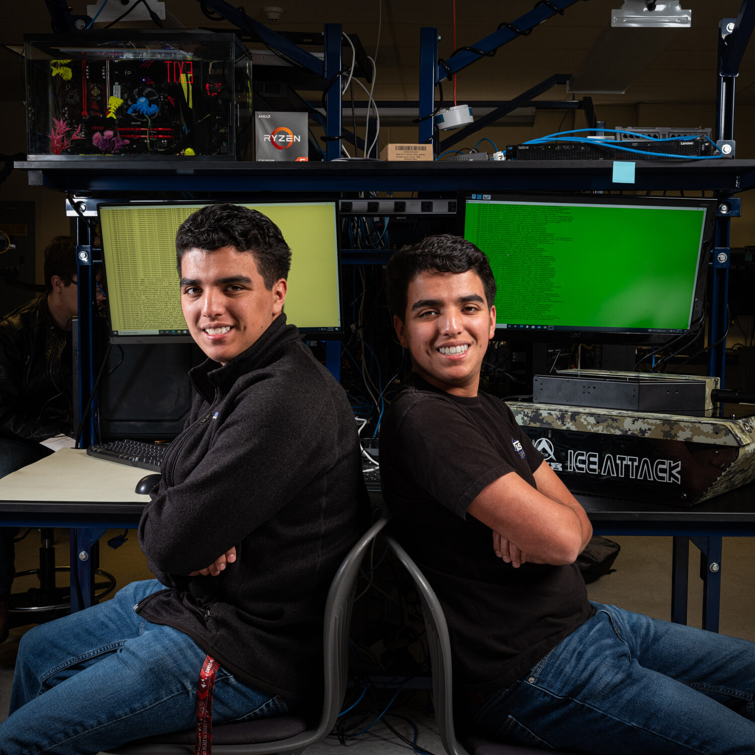 Student using a professional camera in a photography studio.