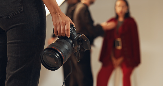 Person Holding Camera for Professional Photography Program